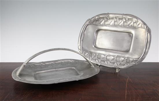 A Liberty Tudric pewter cake basket and a tray